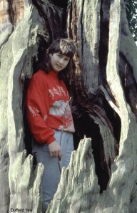 I was so shy, I had to hide inside this tree! Check out the mullet! I'd just started secondary school when this photo was taken.